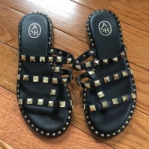 Black studded leather slip on sandals